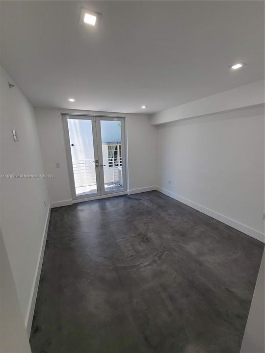 2nd Bedroom with access to private patio