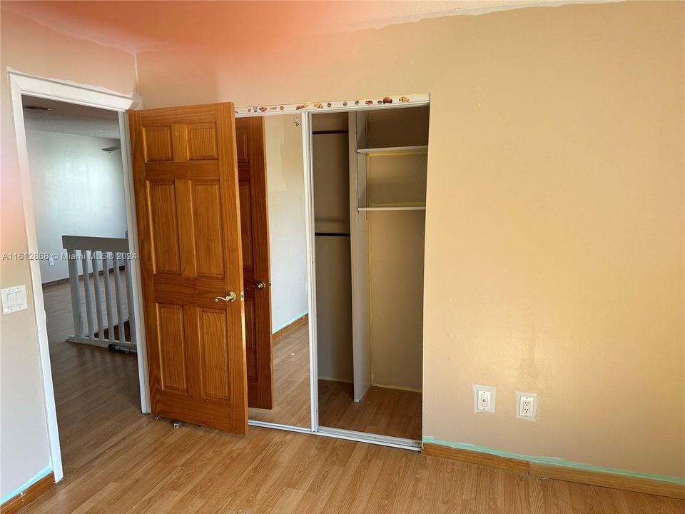 2nd bedroom upstairs with closet