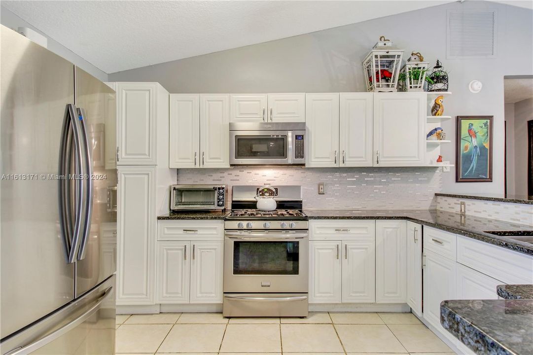 Glass Doors from Kitchen Lead to Patio