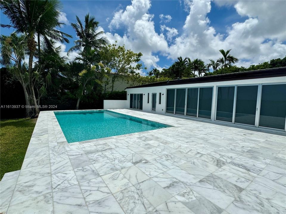 EXPANSIVE MARBLE POOL DECK