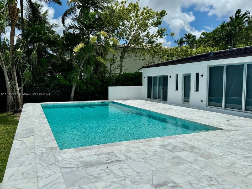 EXPANSIVE MARBLE POOL DECK