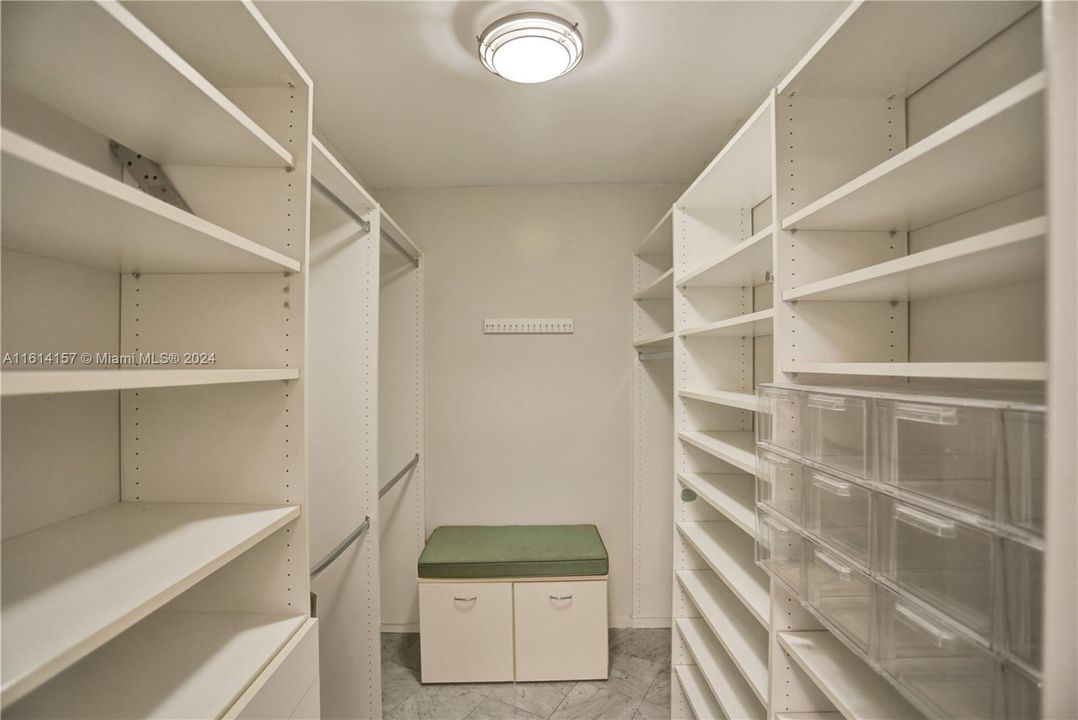 One of two walk-in closets in the main bedroom