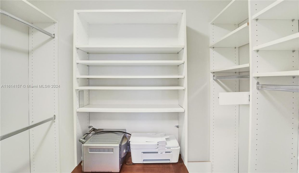 One of two walk-in closets in the main bedroom