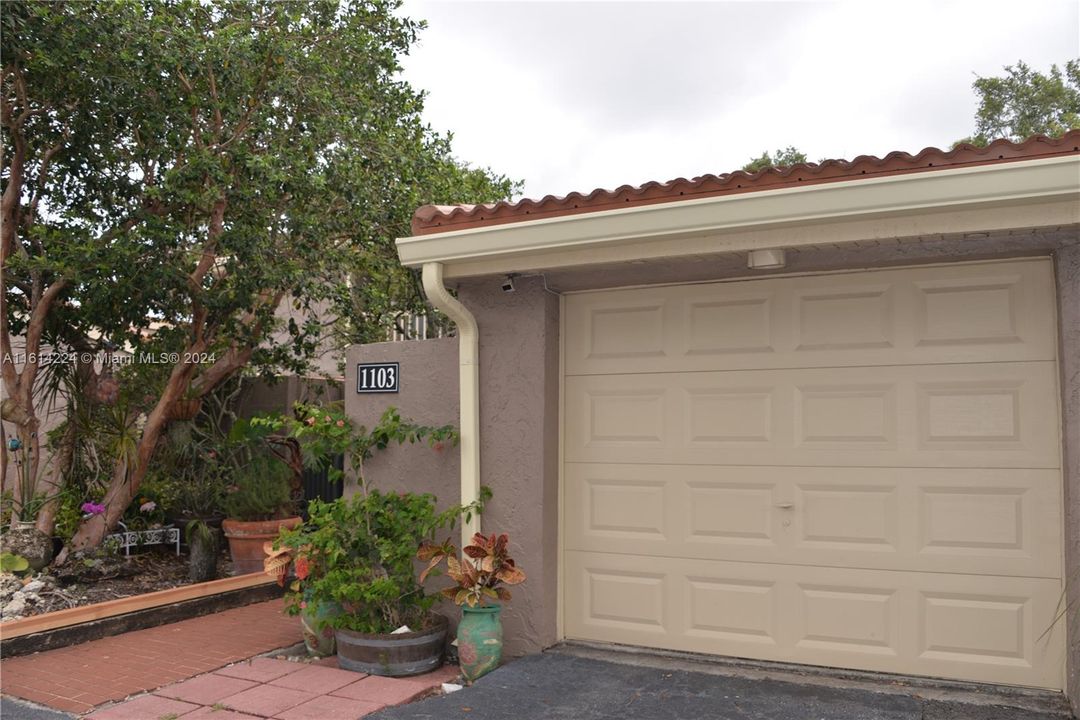 Entrance of Townhouse thru front patio/garden area..