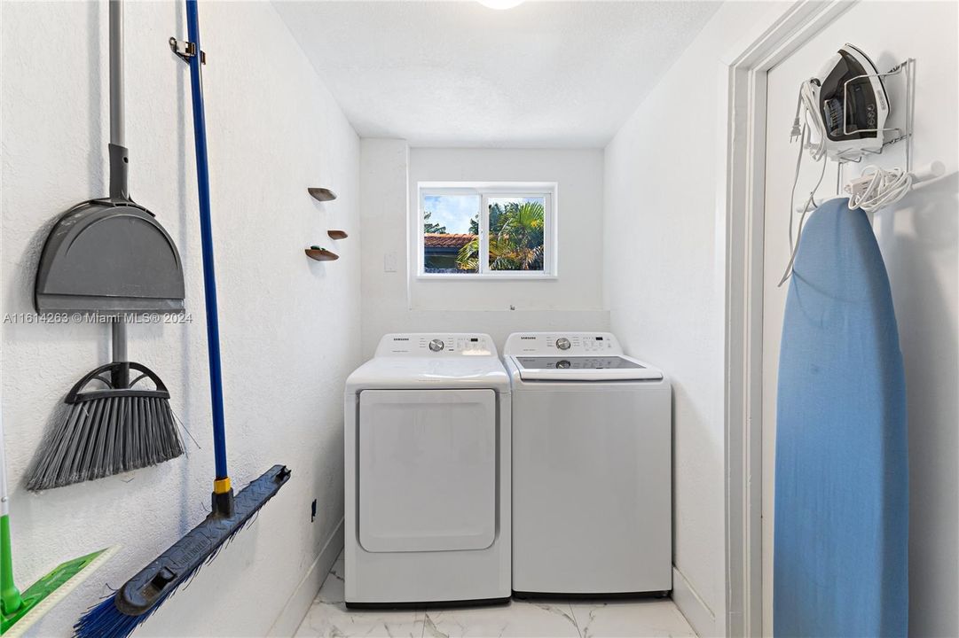 Large and separate laundry room.