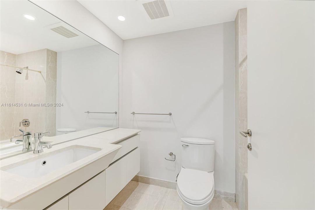 2nd bathroom with tub and shower.