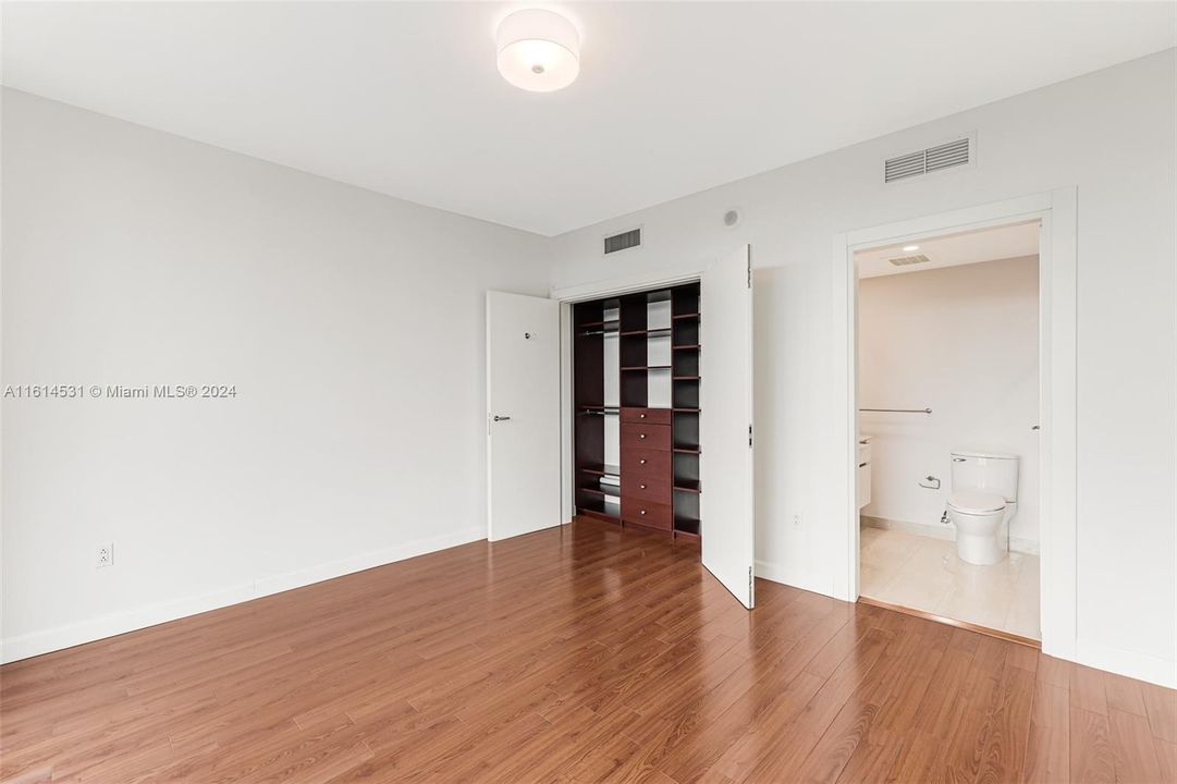 2nd bedroom with built-out closet.