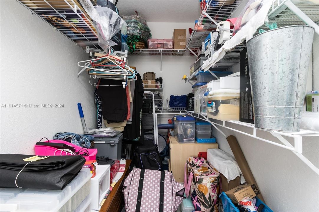 Walk in closet in guest room