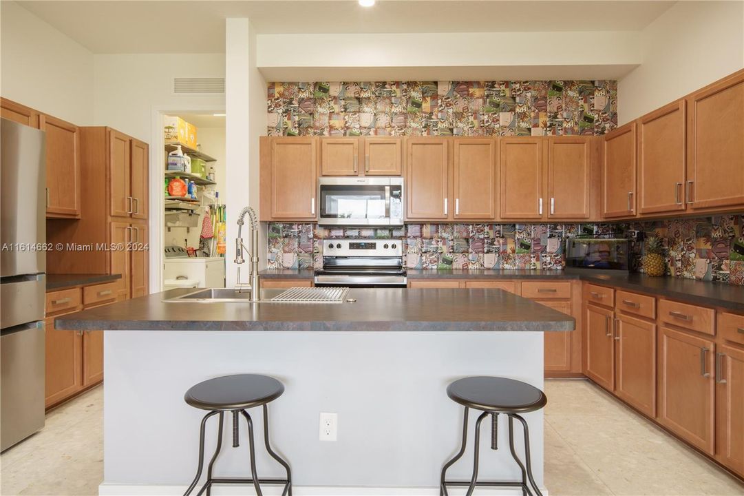 Lots of Wood Cabinetry in the Kitchen