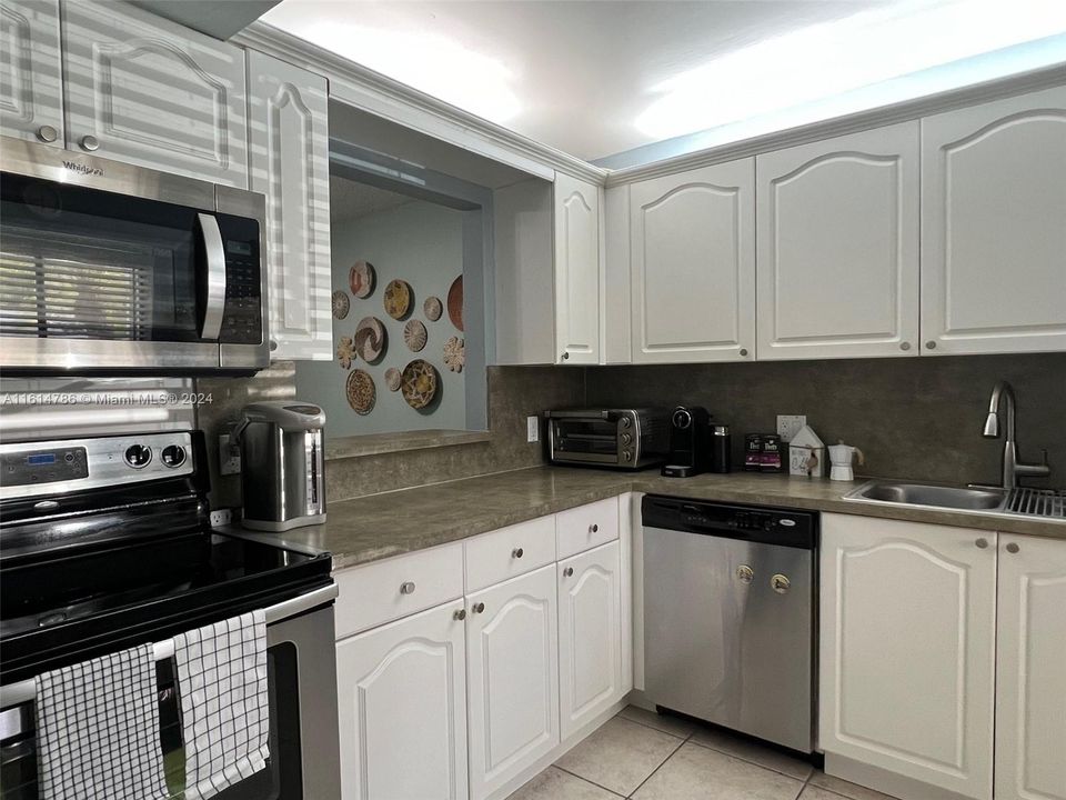 Kitchen complete with stainless steel appliances