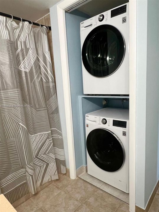 In-unit laundry inside common bathroom