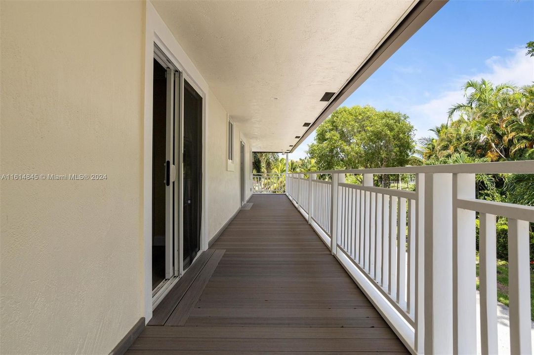 Primary bedroom wraparound balcony