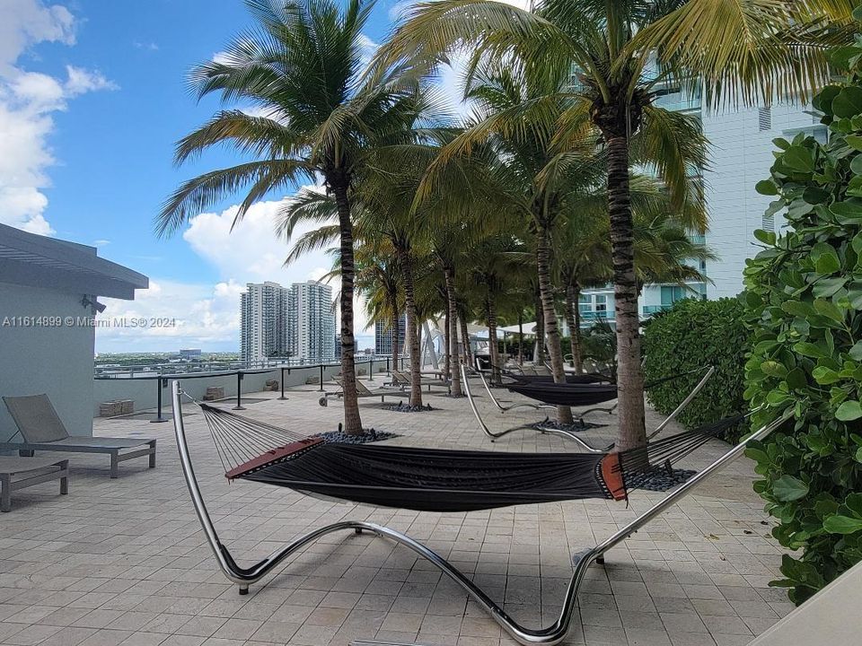 Enjoy a hammock swing on the extensive pool deck