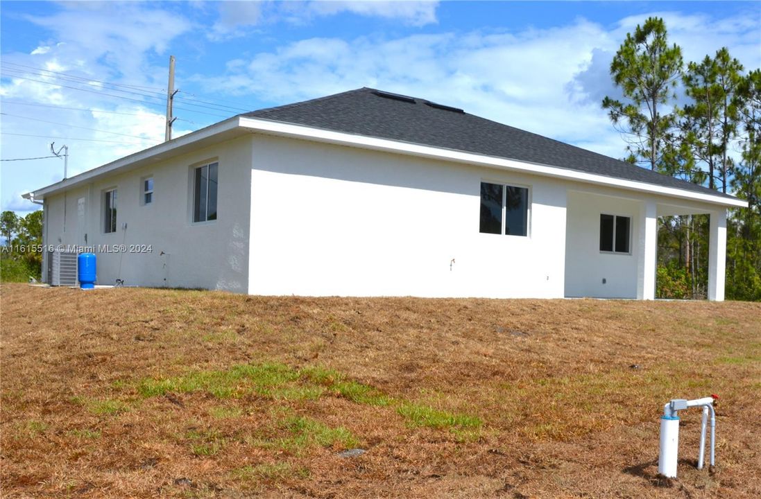 Rear view of property showing Well