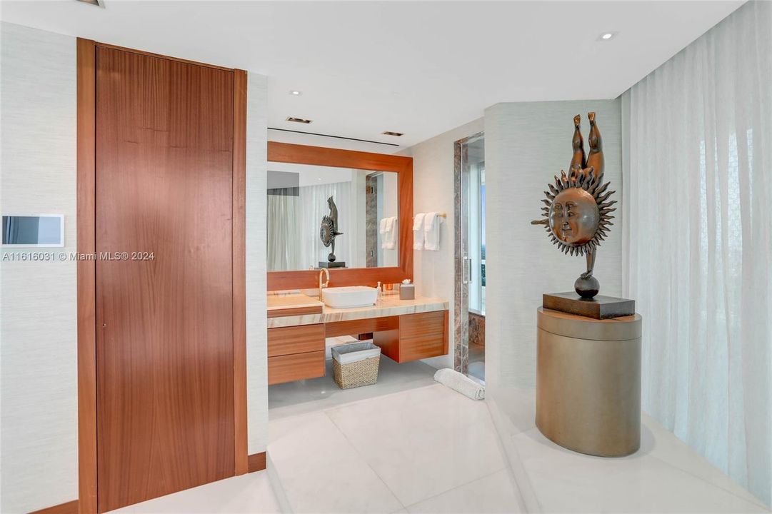 Dual sinks in master bedroom.