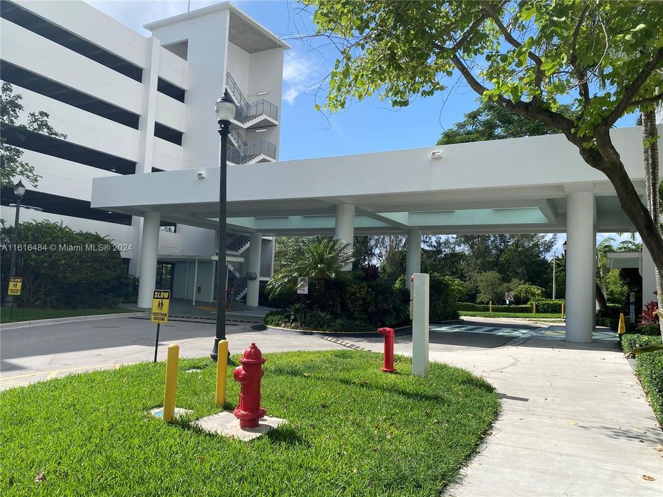 Glass Canopy & Parking Garage w/ drive in Valet