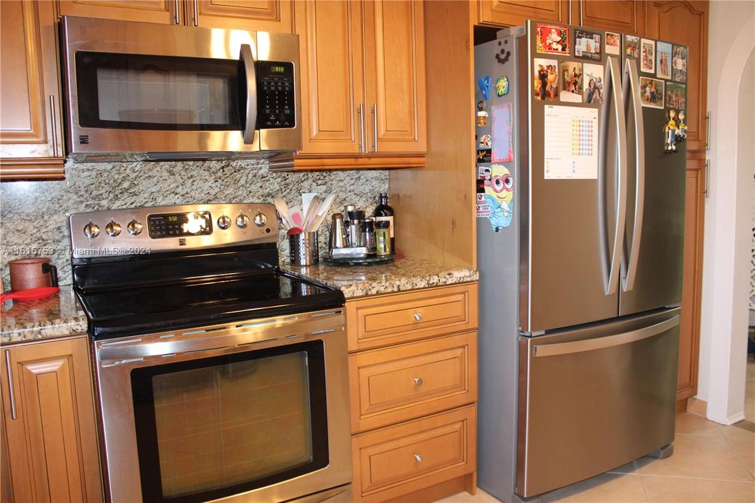 Granite, wood and new appliances