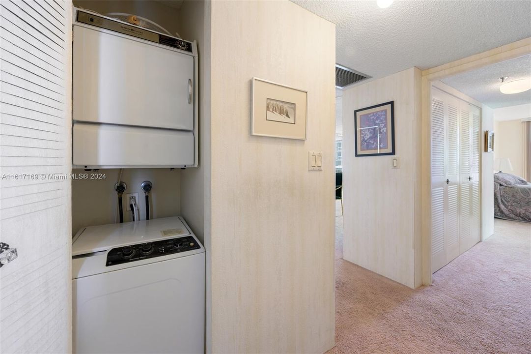 washer and dryer inside the unit.