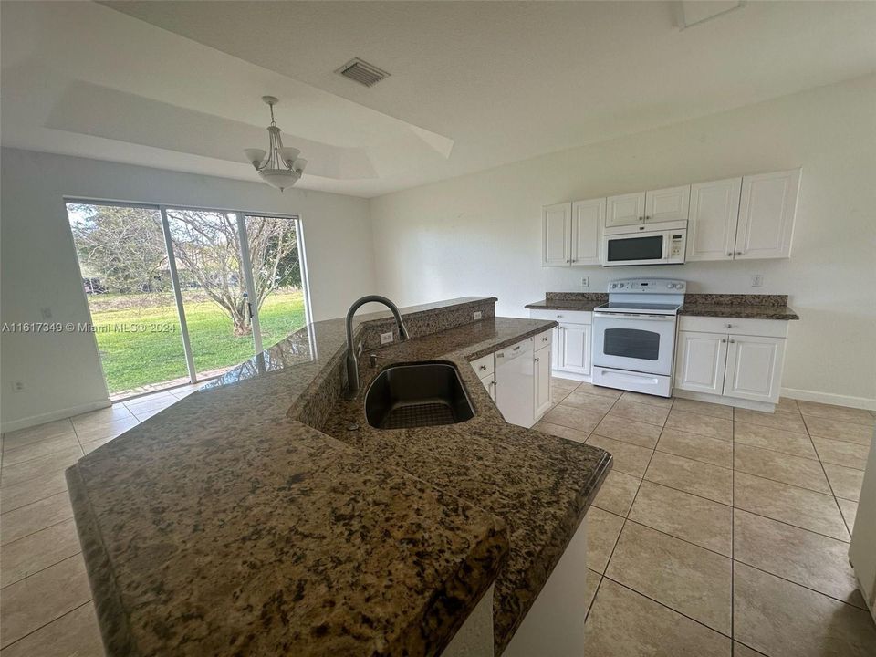 Active With Contract: $3,850 (4 beds, 2 baths, 1953 Square Feet)