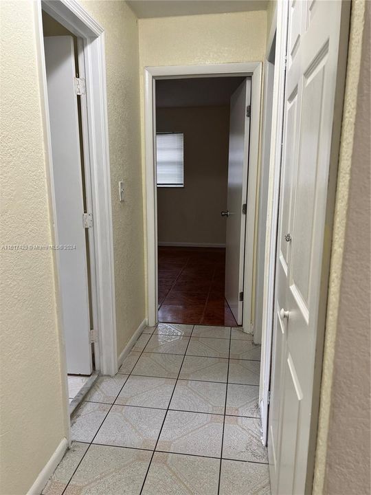 Hallway view to third bedroom