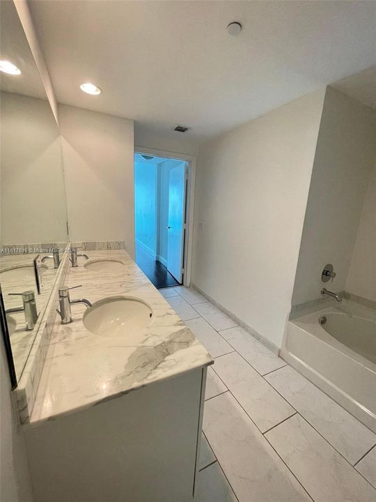 Master bathroom with shower and separate tub