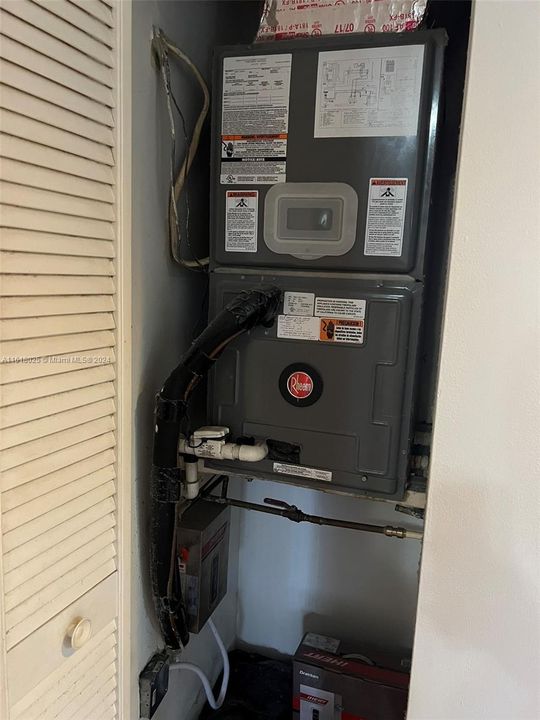 AC Unit and Electric Water Heater.