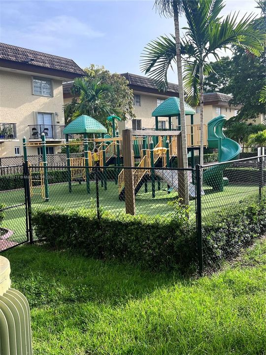 playground conveniently located in front of unit