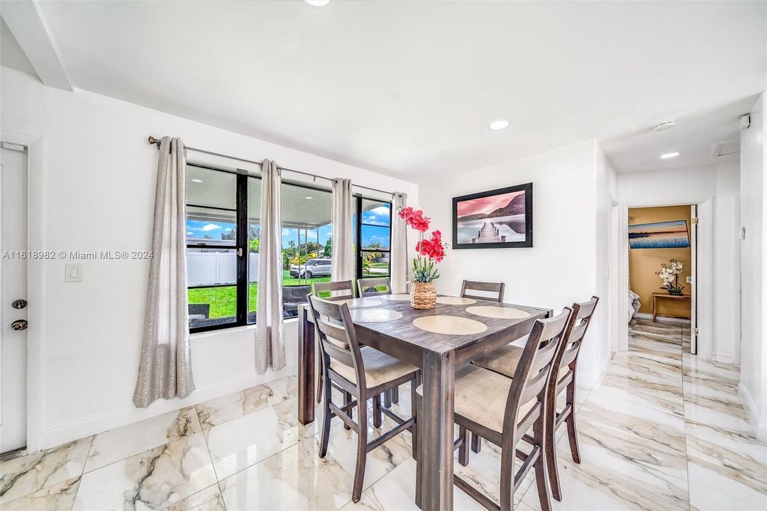 Lots of natura light.  Dining Area overlooking the patio and back yard