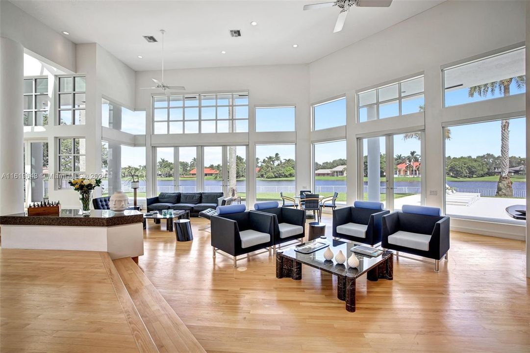 A living room to dream of with views of the lakefront, and birds from the Everglades.