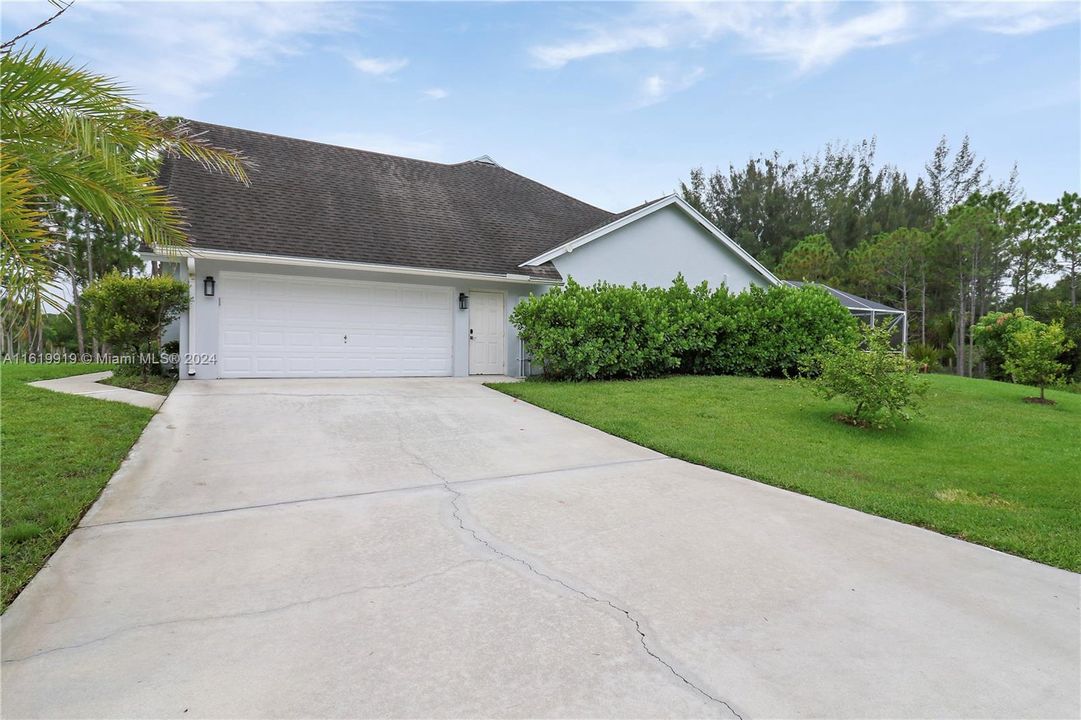 Large concrete driveway/parking pad