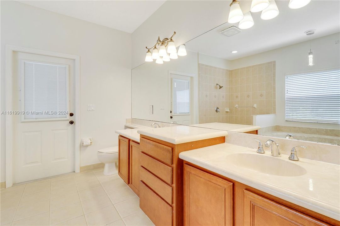 Large primary bathroom also serves as the cabana bath