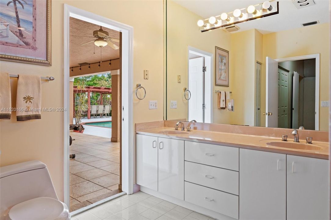 Master Bathroom opens to outside patio and pool