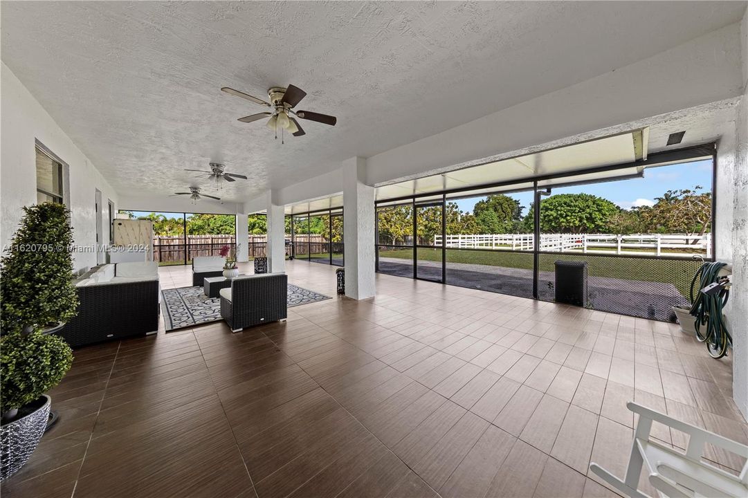 sunroom off family room overlooking the farm. She's lovely, great space, screened w blinds