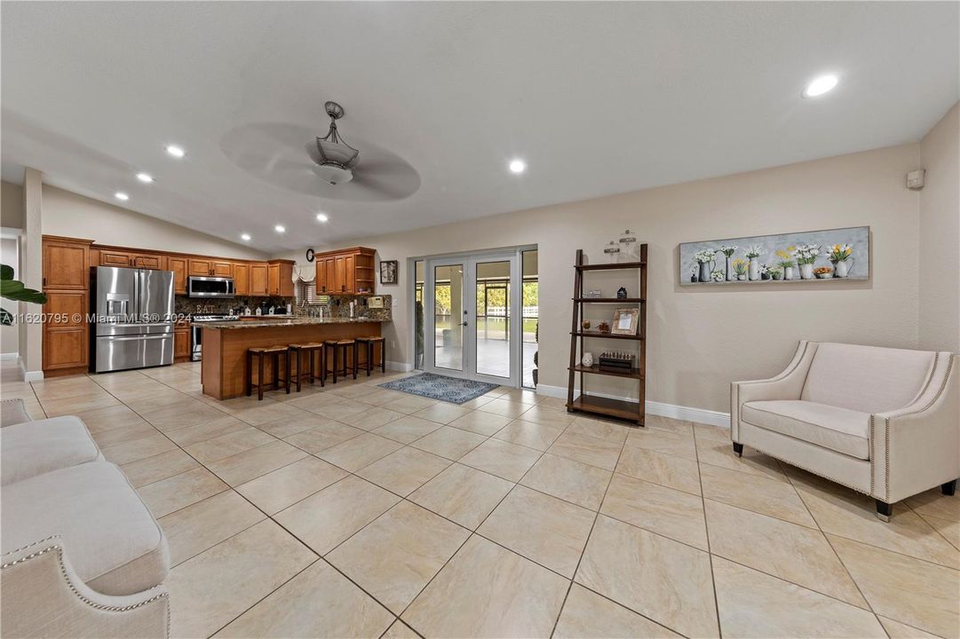 back in from dbl doors into family/kitchen