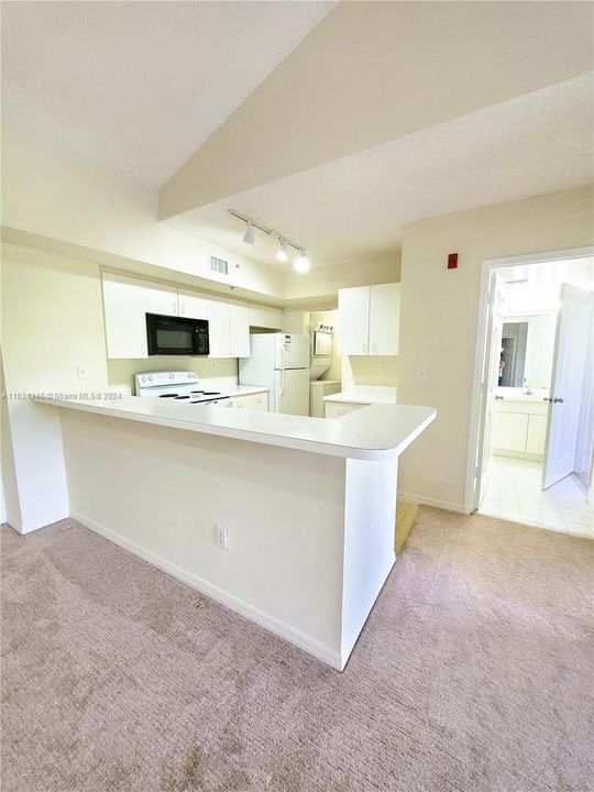 Kitchen, Countertop, and In-Unit Washer & Dryer