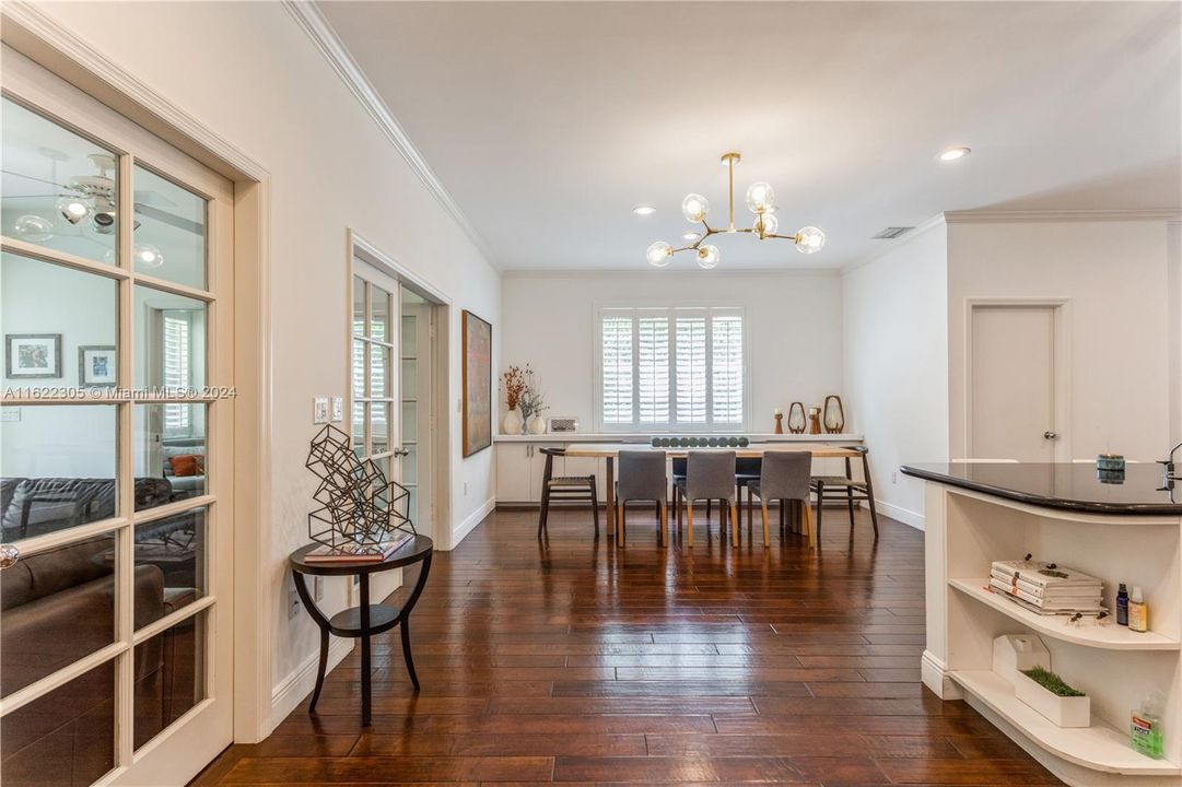 View from Kitchen to Dinning Room and entertainment Area