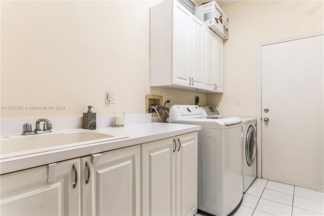 Laundry Room Cabinets and Washer and Dryer