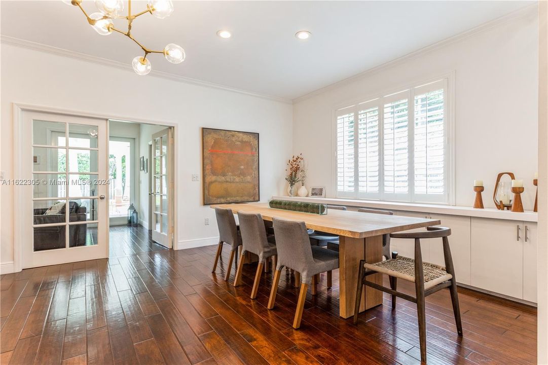 Dinning Room Serving Cabinetry and view to Entertainment Area