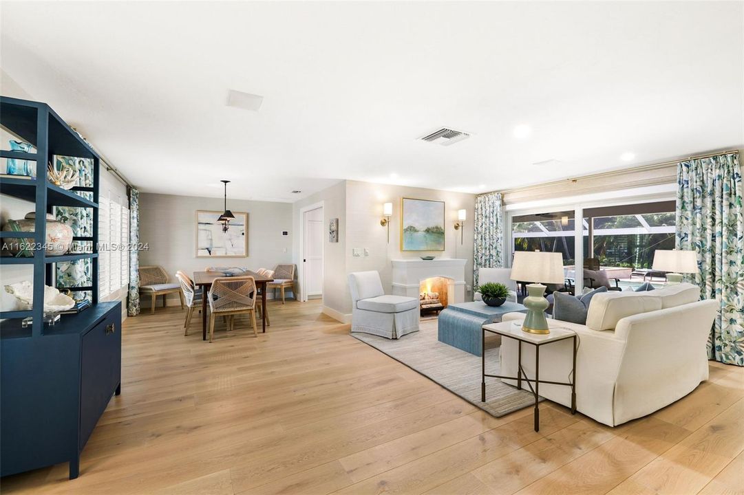 Main Living and Dining showcasing white oak hardwood floors throughout the home