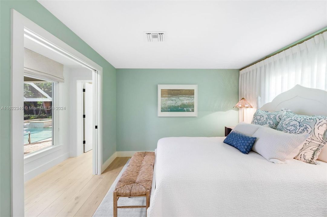 Secondary bedroom overlooking pool area