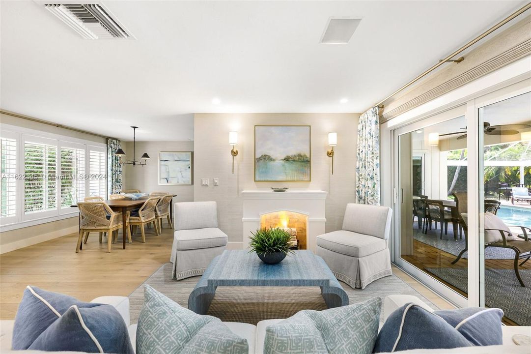 Main living area showcasing decorative fireplace