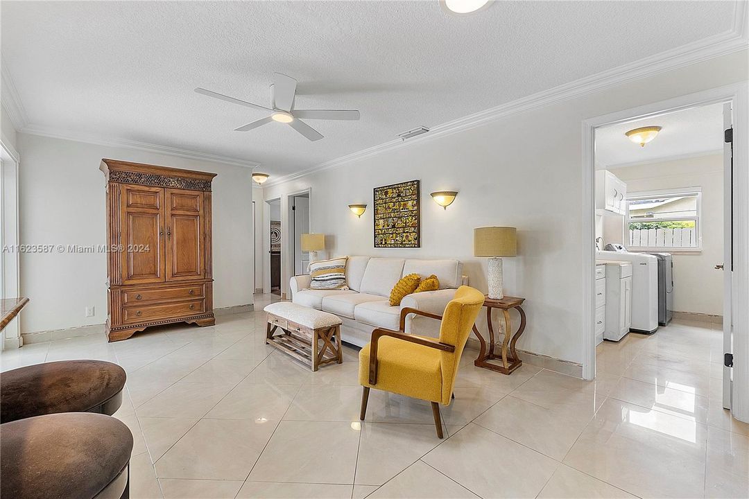 Separate Laundry Room can be completely hidden.  Just close the door.