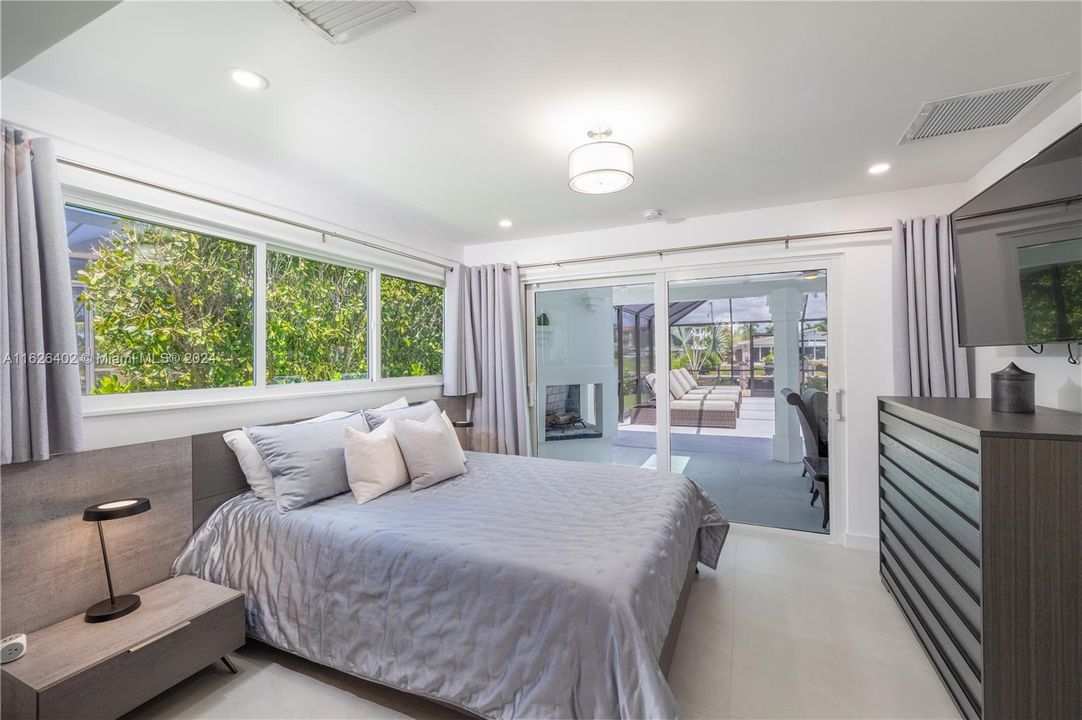 2nd bedroom facing pool with private bathroom