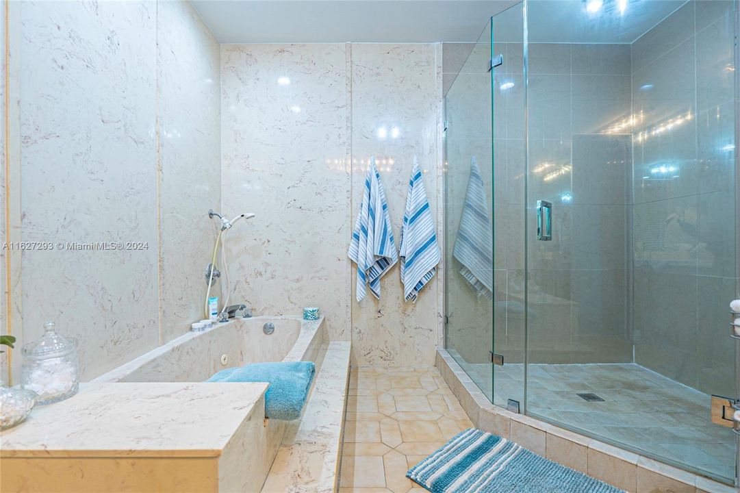 Primary Bathroom glass enclosed Shower