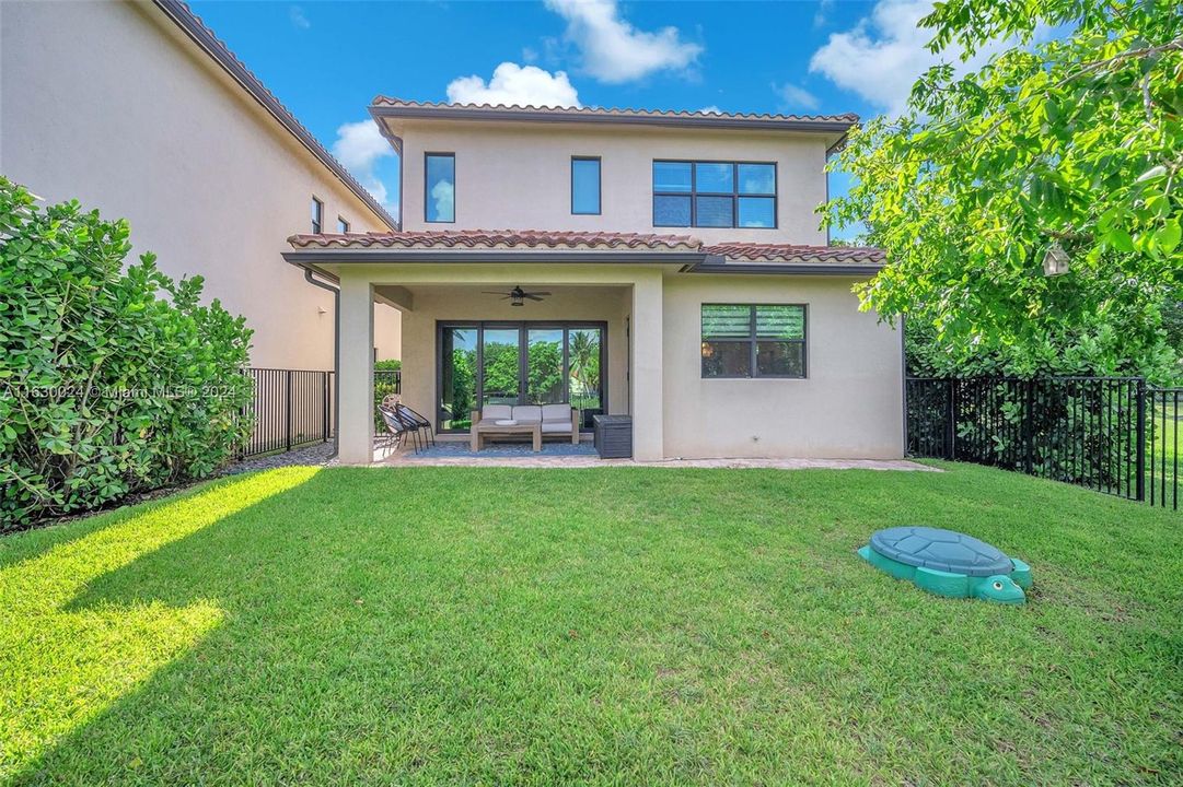 Back Patio with with Nice Lawn & Hedging