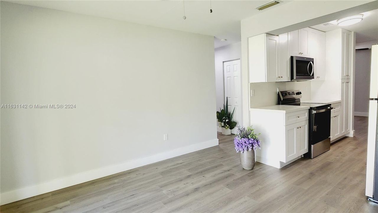 View of galley kitchen from the family room.