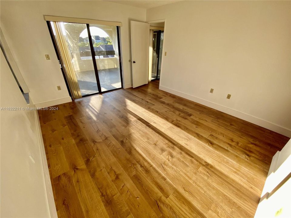 Master bedroom has sliding door to the balcony