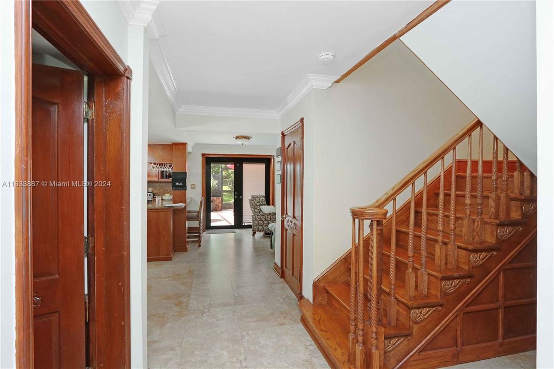 Stairs and hallway leading to the Kitchen Family Room