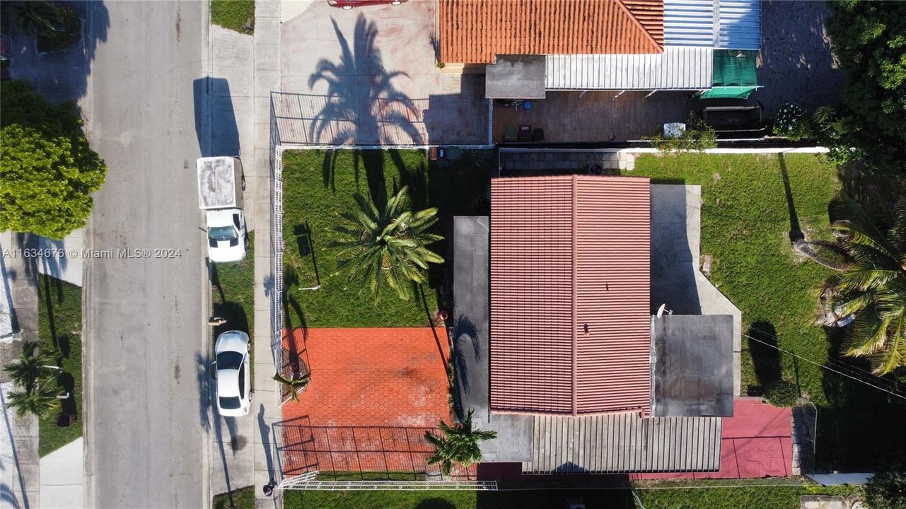 Covered Patio area with parking access.