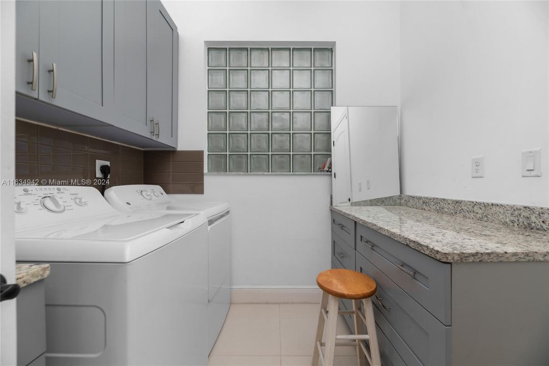 cabinets added to laundry room by owner